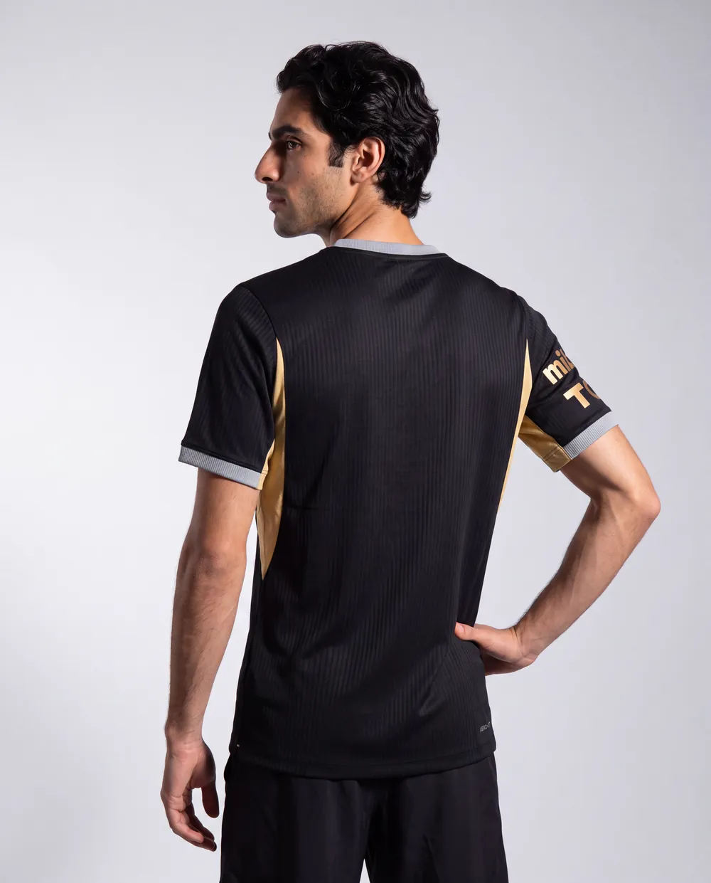 Away shirt on model, back